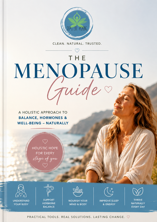 Book cover for 'The Menopause Guide' featuring a smiling woman outdoors against a soft-focus coastal background, with large blue and pink title text and a teal circular logo at the top.